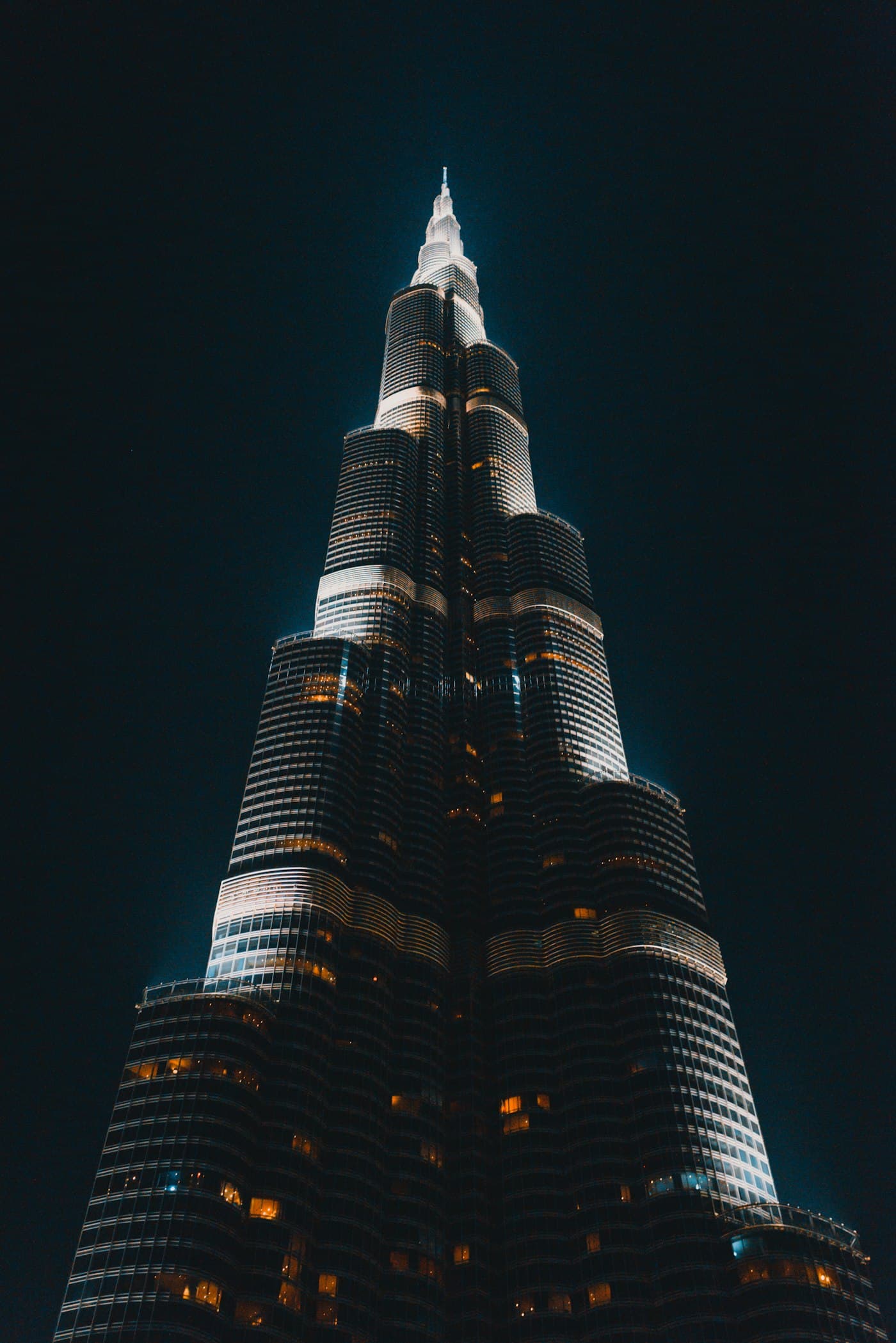 The Burj Khalifa lit up against the night sky